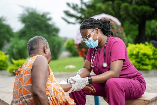 image-african-young-nurse-facemask-600nw-2320763893